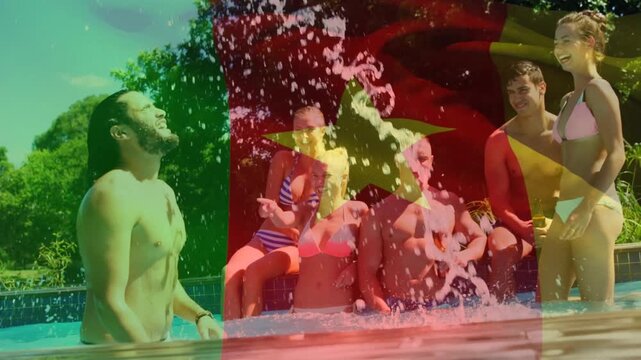 Animation of flag of senegal over happy caucasian friends having fun at swimming pool