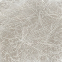Fototapeta premium White threads create a simple pattern on a light background at a close range during daylight hours