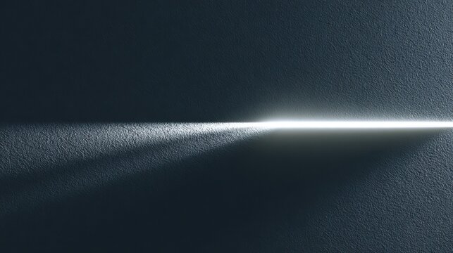 Minimalist light beam on dark textured wall, dramatic ray of light across navy blue surface, cinematic shadow and highlight contrast