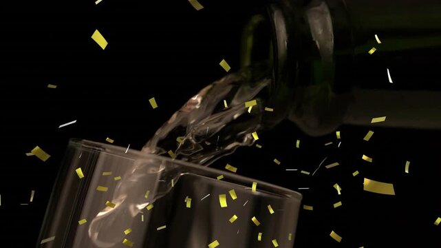 Animation of falling confetti over glass of champagne on dark background
