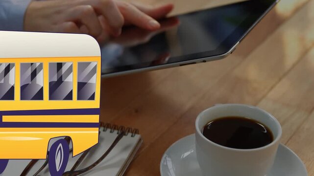 Animation of school bus icon over hands using tablet in office