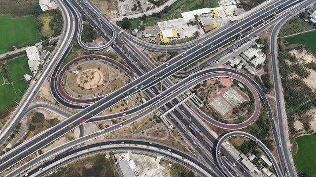 Aerial top view of highway interchange traffic