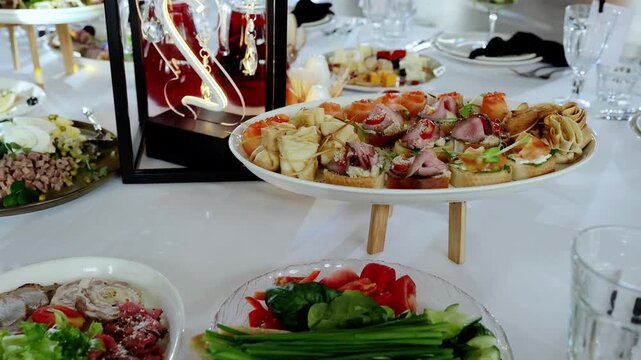 Gourmet canapes with meat, fish, vegetables artfully plated on crisp white surface, showcasing refined culinary presentation for upscale dining experience