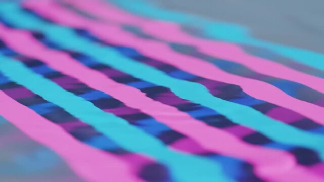 Abstract illustration showcases vibrant pink and teal ribbons gracefully interwoven, creating a visually captivating and dynamic pattern with a sense of depth and movement across the surface