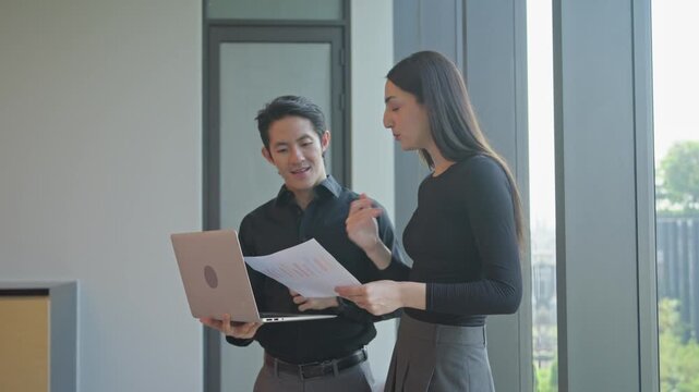 Collaborative team meeting modern office business interaction bright environment eye-level view professional growth