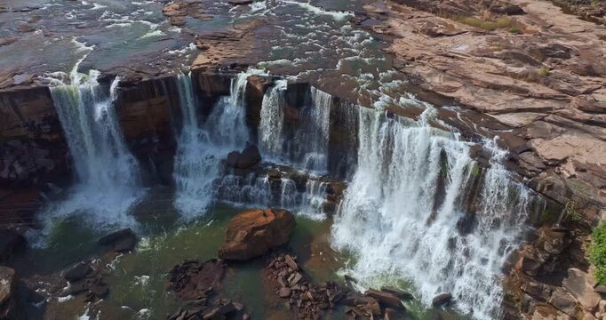 The Raw Beauty of Sae Pong Lai Waterfall, Laos
Sae Pong Lai Waterfall Surrounded by Lush Green Forest
Aerial view of Majestic Layers of Rock and Water at Sae Pong Lai Falls
