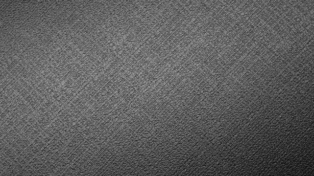 Seamless Abstract gray texture. Slow, smooth loop rotation of a gray, rough surface, gently rotating under the light, creating subtle highlights.