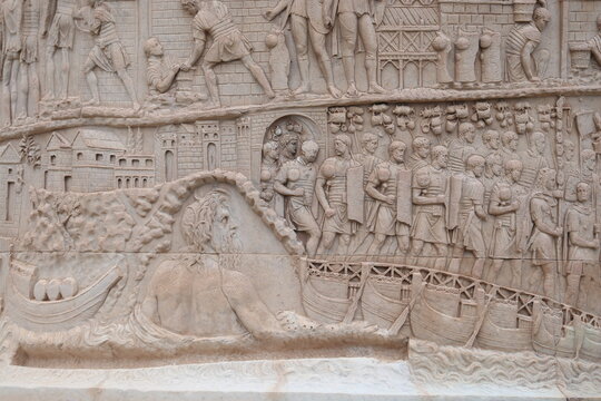 Trajan's Column Sculpted Detail with Sea God in Rome, Italy