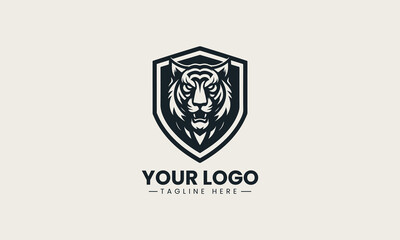 Fototapeta premium Black tiger head inside shield shape is presented as strong monochrome vector logo on clean white background for sports and security branding use