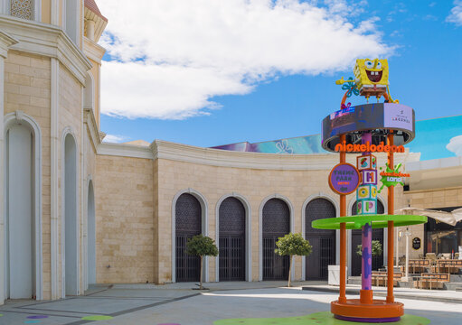 Belek, Turkey - March 30, 2026: Exterior view of the Nickelodeon Land entrance at Land of Legends Antalya, featuring colorful SpongeBob SquarePants statue under sunny blue sky