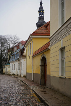 Cobblestone street with colorful historical buildings