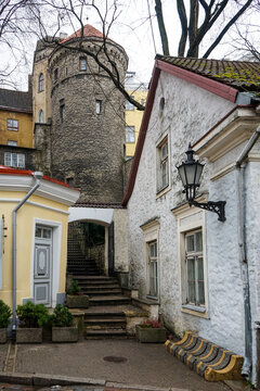 Medieval stone tower and historical alleyway