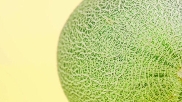 Macro Extreme Close-up of Fresh Muskmelon Cantaloupe with Detailed Netted Skin Texture, Organic Fruit for Food Ads