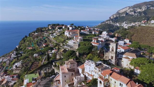 Aerial view of Ravello's stunning architecture, where the buildings cascade down the hillside towards the sea, Ravello, Campania, Italy.