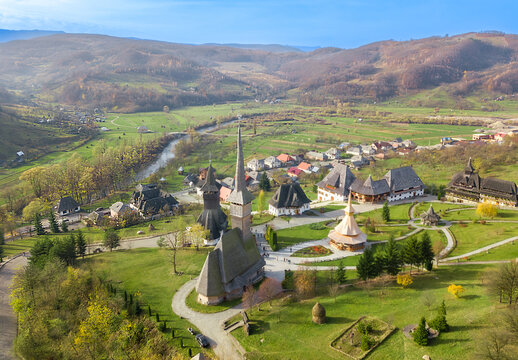 Barsana monastery with its traditional wooden churches standing in the iza valley landscape