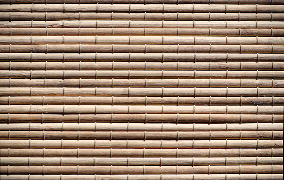 Woven wooden bamboo blinds texture creating natural background