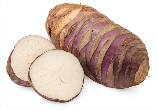 Taro root with purple skin and brown texture, featuring a sliced portion revealing its white flesh, isolated on white
