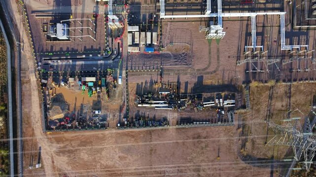 Aerial view of the Bramford 400kV Substation revealing its intricate network of power infrastructure, Ipswich, England, United Kingdom.