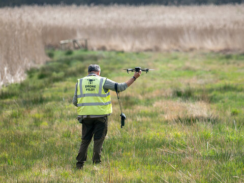 Usk Monmouthshire Wales UK April 03 2026 drone pilot with battery powered drone lifting off