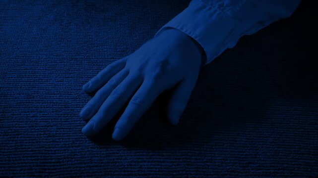 Man Unconscious On The Floor In Dark Office
