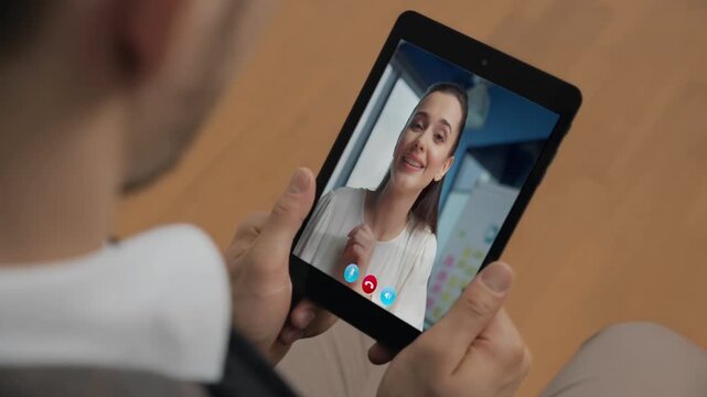 Happy colleagues tablet meeting at office closeup. Unknown man holding computer