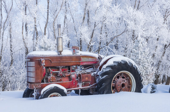 old tractor, winter, near Dufresne, Manitoba, Canada