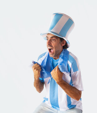 Fanatic man with top hat, t-shirt and Argentine flag