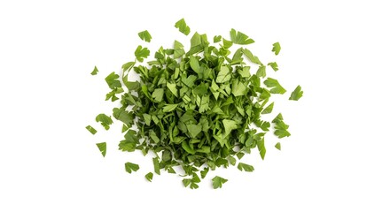 Obraz premium A top-down view of a small mound of freshly chopped green herbs, possibly parsley or cilantro, isolated on a clean white background.