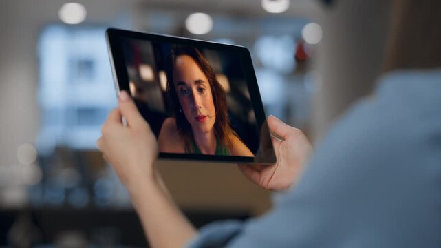 Worried boss video calling to subordinate at tablet close up. Lady talking web 