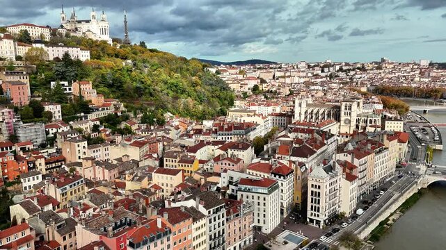 Downtown Lyon aerial view, flying above historical city center of Lyon, France with view of Church Notre Dame de Fourviere