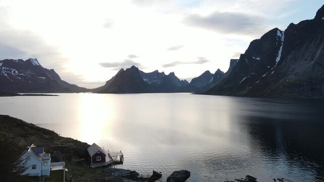 Aerial images of a landscape in the village of Reine in the Lofoten Islands, Norway, on a cloudy day, drone footage, 4k 30fps