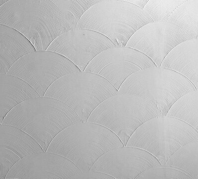 White Artex Ceiling Texture with Decorative Fan Pattern Background and Scalloped Plaster Design