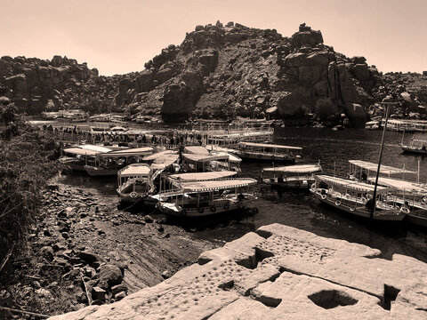 Nubian boats on the nile at Philae Temple in Aswan Egypt. Black and white