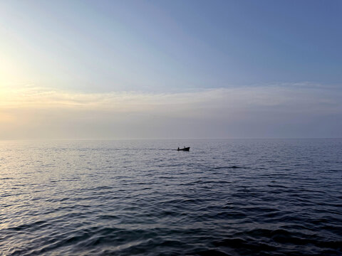 Ocean and dusk sky.