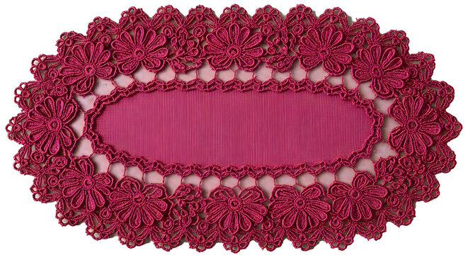 Intricately designed pink lace doily with floral pattern and oval center