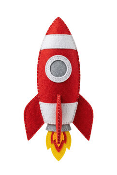 Red felt toy rocket isolated. Space exploration craft mockup.