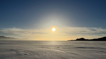Obraz premium Environmental awareness and climate change showcasing a scenic view of salt flats at sunrise A clear sky distant mountains and a tranquil landscape promoting sustainability and conservation efforts.
