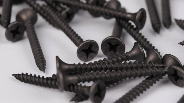 Metal screws for fastening equipment. Soft focus. Close-up. 