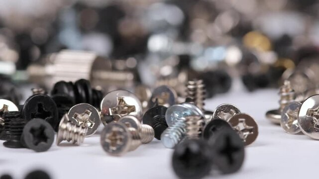 Metal screws for fastening equipment. Soft focus. Close-up. 