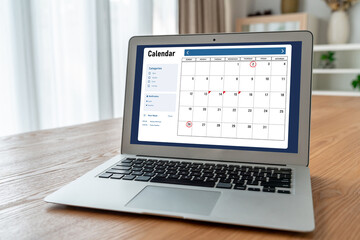 Fototapeta premium Calendar on computer software application for modish schedule planning for personal organizer and online business
