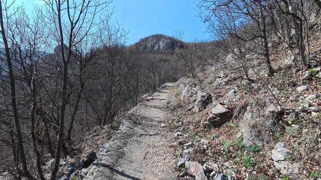 Rugged path winds through bare, rocky hillsides. Lazarev (Lazar's) Canyon. Balkans, Serbia.