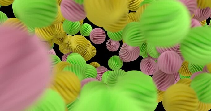 3D animation featuring multiple colorful spiral ball objects falling across the screen in a playful and dynamic composition. Ideal for fun, abstract, kids, candy-like, festive, and motion graphics pro