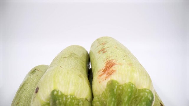 Close up of courgette on white background isolated