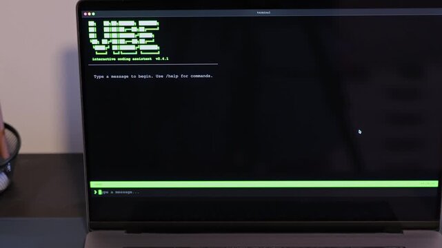 Middle Aged Man Turns Hacker in Hoodie After Using Vibe Coding Command Line Interface Artificial Intelligence Large Language Model Assistant Concept