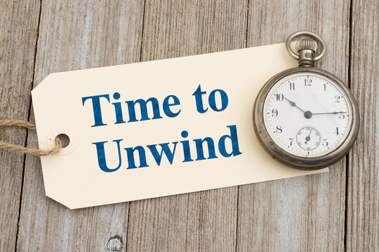 Time to unwind tag with vintage pocket watch