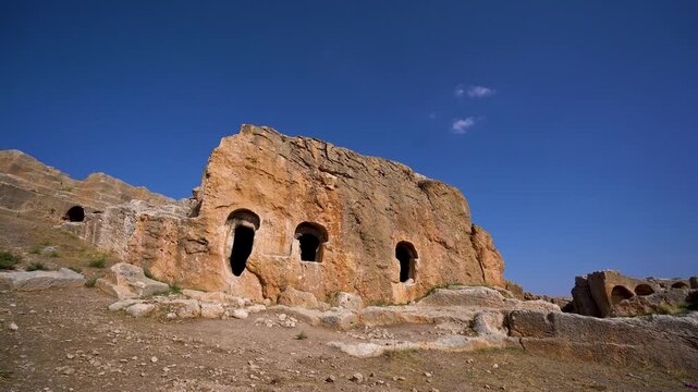 Ruins of rock cut building in Dara ancient city