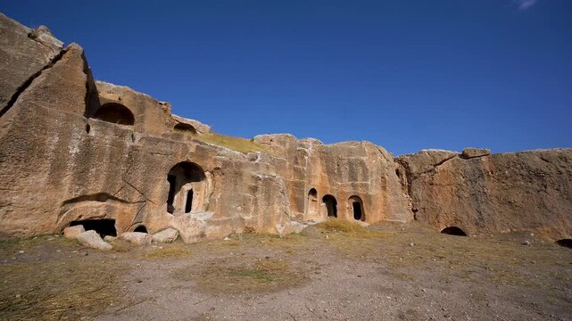 Ruins of rock cut building in Dara ancient city