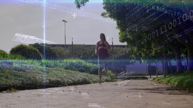 Runner closing on camera on path, starting light bands and fitness data, checking wrist for pace