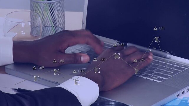 Vertical video: Hands suit cuff poised typing on laptop at desk, overlay tracking fingers and pen