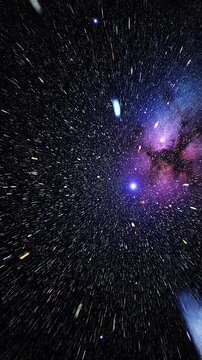 A seamless loop of traveling at high speed through a dense field of stars and colorful nebulae in outer space.